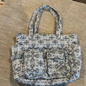 Large baby bag in pretty grey with pink accents design. 19’ wide x 14’ deep.